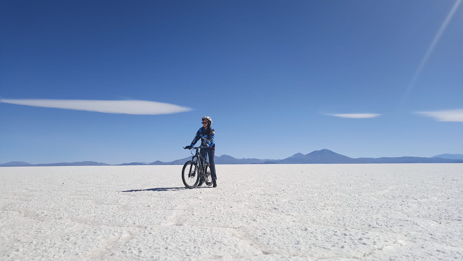 Woman enjoying the death road tour in Bolivia